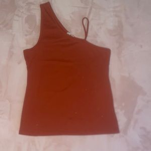 Red orange tank top with left side spaghetti strap.